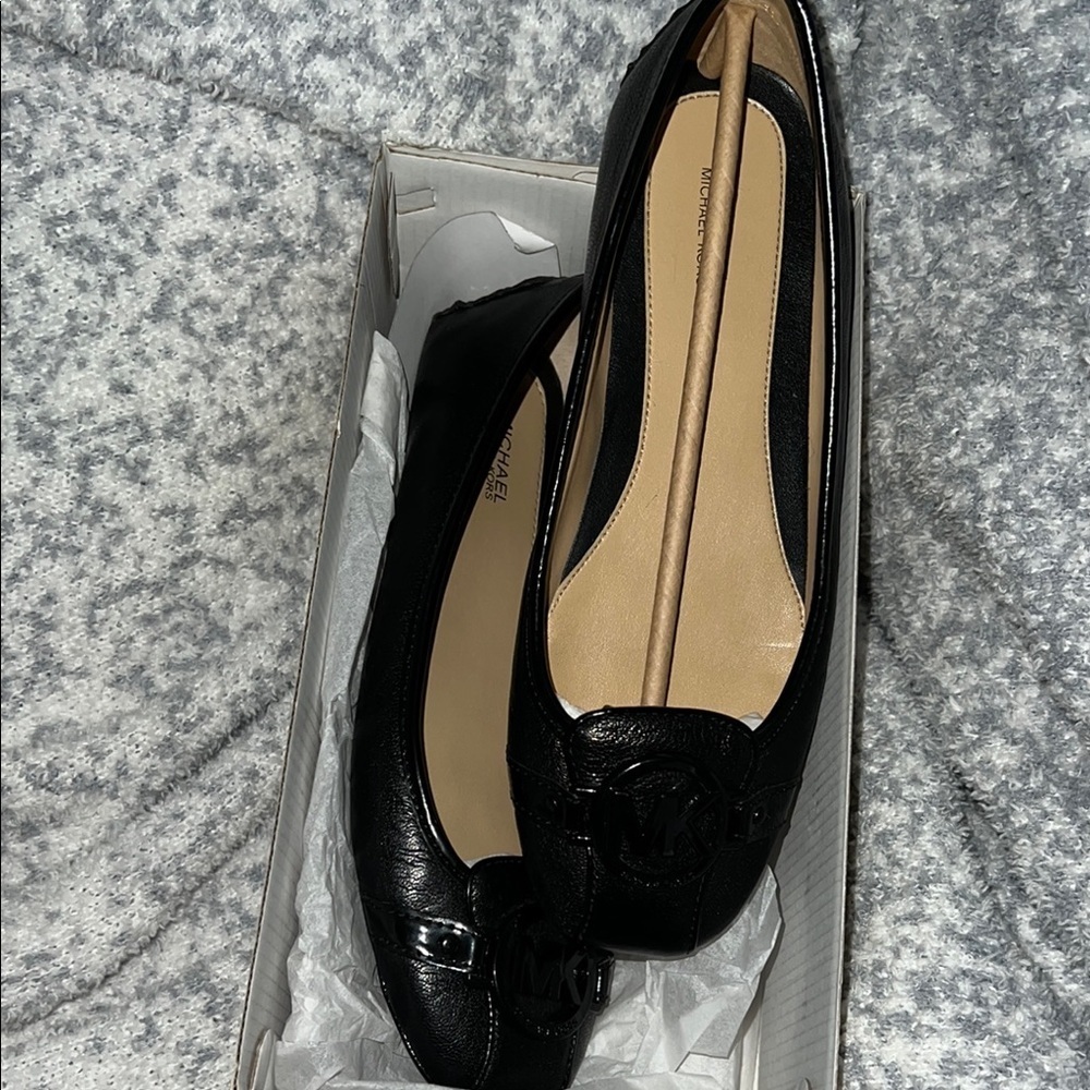Michael Kors Black Flats with Elegant Design